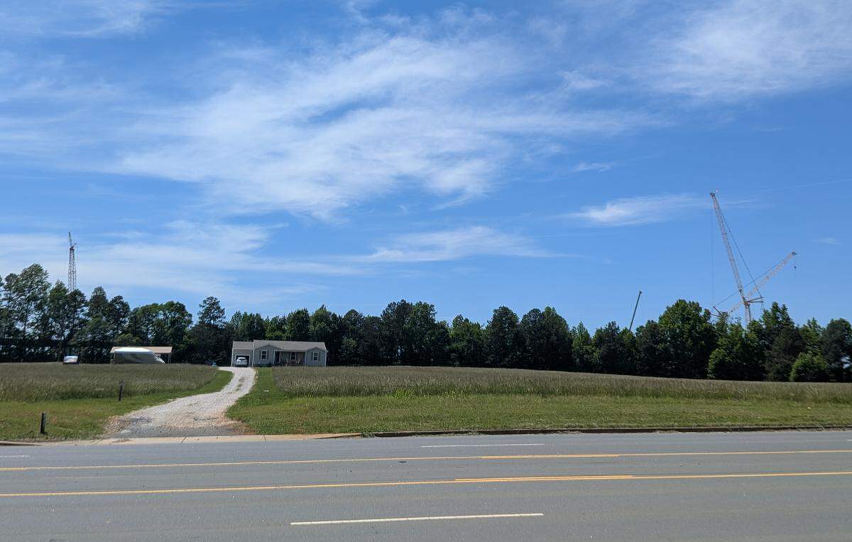 QTS data center campus development is under way behind a house off Hands Mill Highway in York County. A panel of company and electric utility officials on Tuesday held its third community meeting at Oakridge Middle School in Lake Wylie answering submitted questions.