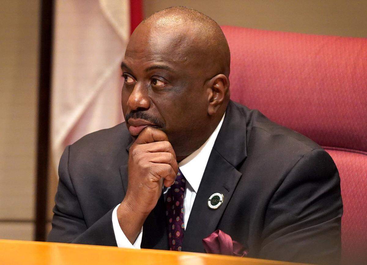 Charlotte City Council member Malcolm Graham listens to remarks during the swearing in ceremony on Monday, December 2, 2019 at the Charlotte-Mecklenburg Government Center in Charlotte, NC.