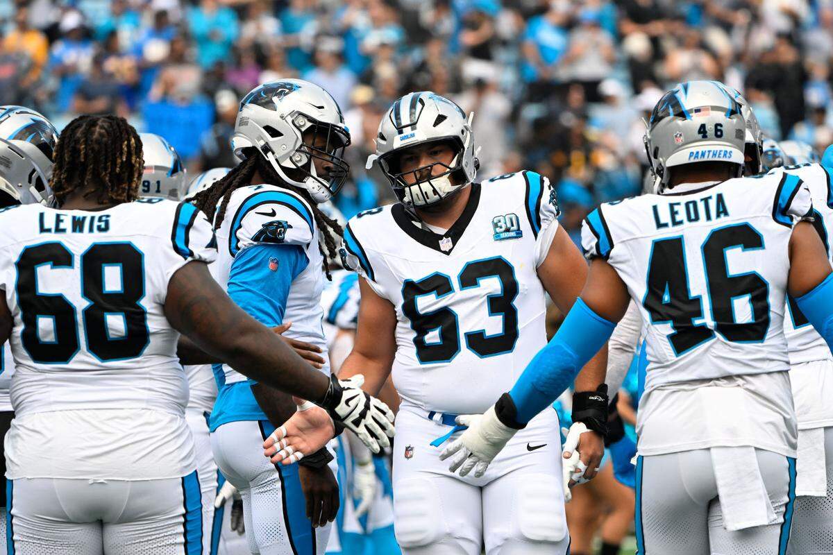 Carolina Panthers center Austin Corbett (63) before a 2024 game at Bank of America Stadium.