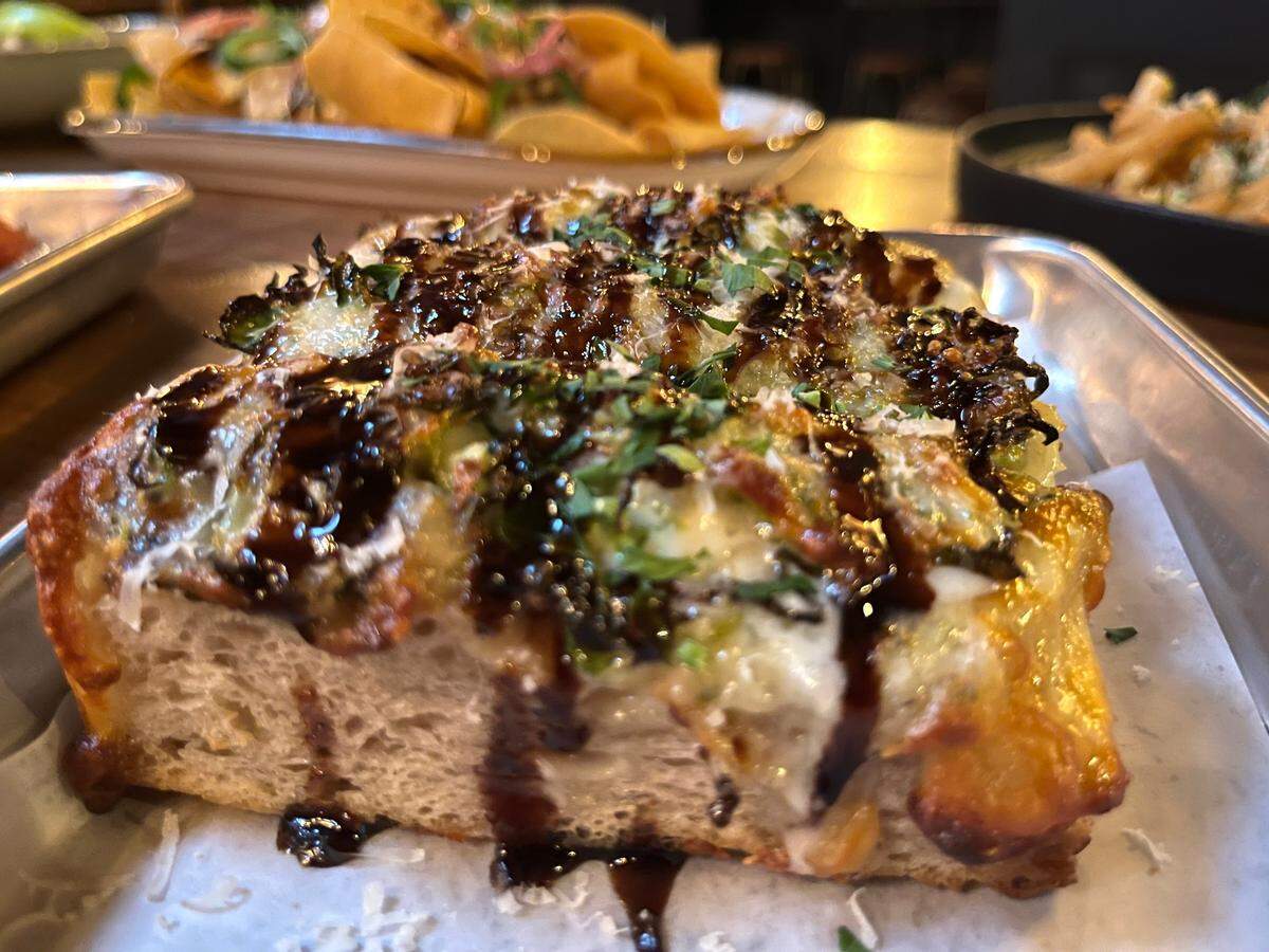 The new Brussels sprout garlic bread pizza at VINYL.