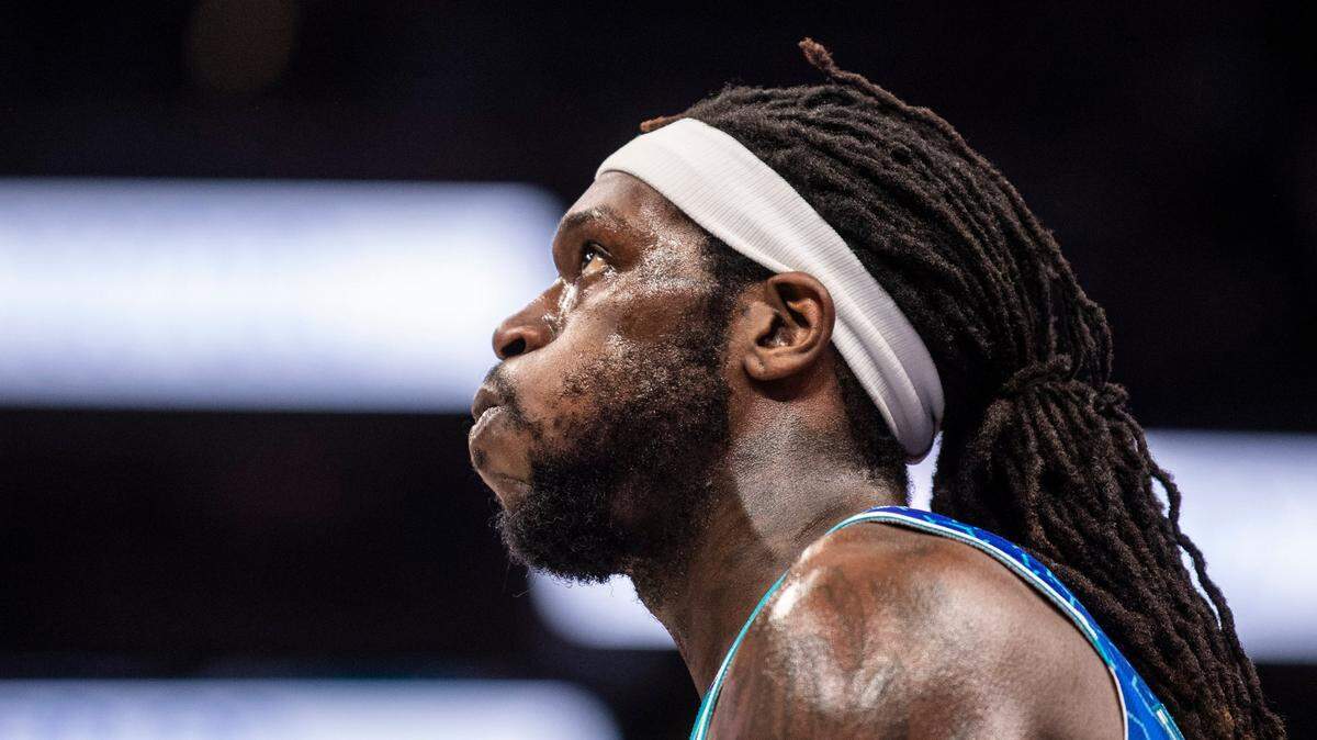 The Hornets center Montrezl Harrell gazes upward between plays during the game against the Grizzlies defense at Spectrum Center on Saturday, February 12, 2022 in Charlotte, NC. The Hornets lost to the Grizzlies, 125-118, making the sixth consecutive loss at home.