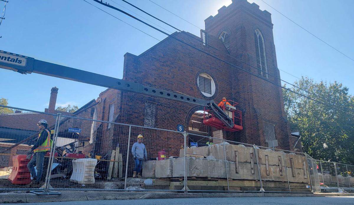 Only portions of the structure of the historic Black Mount Carmel Baptist Church are now being preserved. Pictured here are workers at the church near Johnson C. Smith University on Tuesday, Oct. 24, 2023 in Charlotte