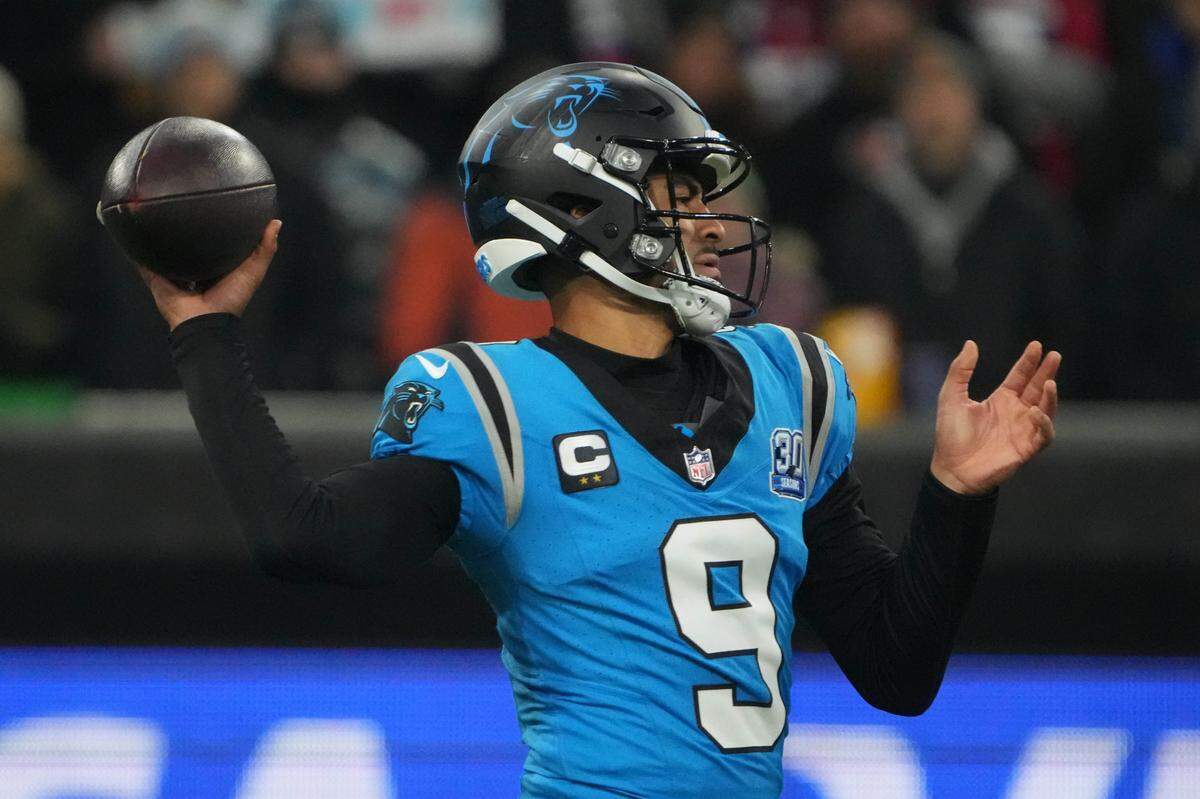 Carolina Panthers quarterback Bryce Young (9) throws the ball against the New York Giants in the first half during the 2024 NFL Munich Game at Allianz Arena.