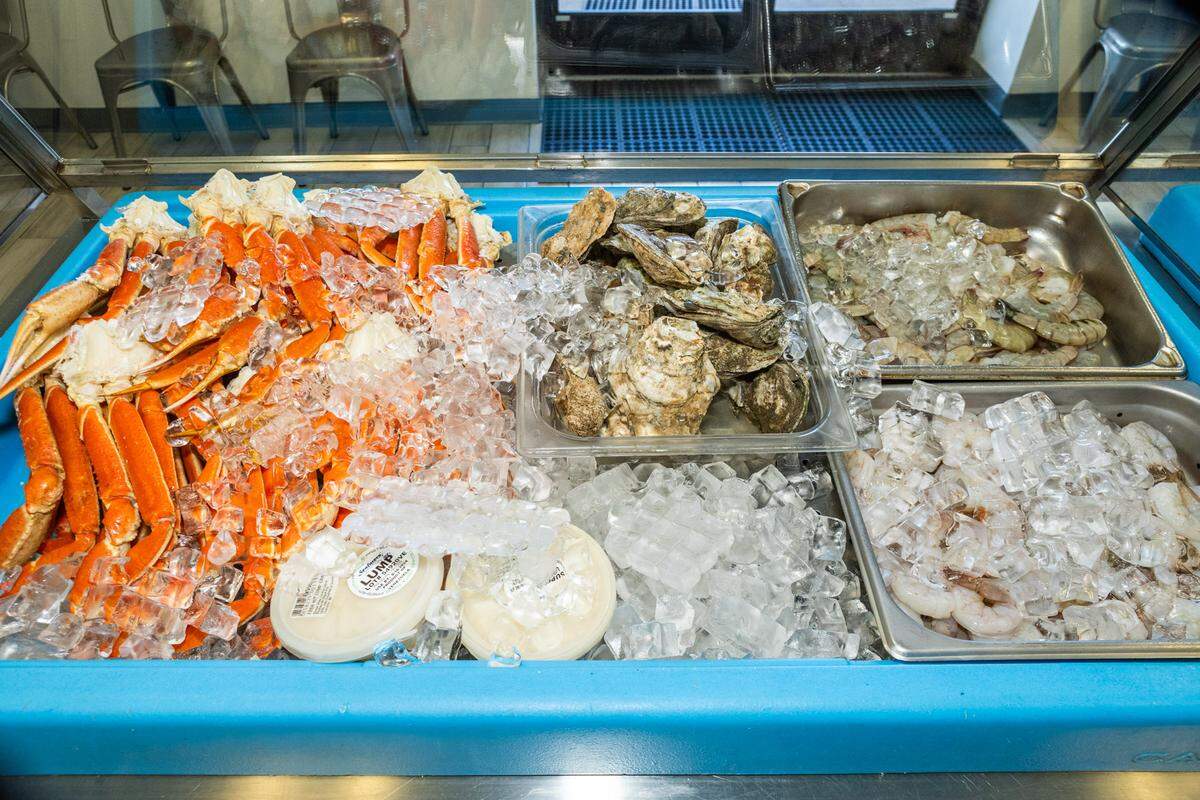 Some of the daily fresh selections at Bryant Seafood Market, including crab legs, shrimp and oysters.