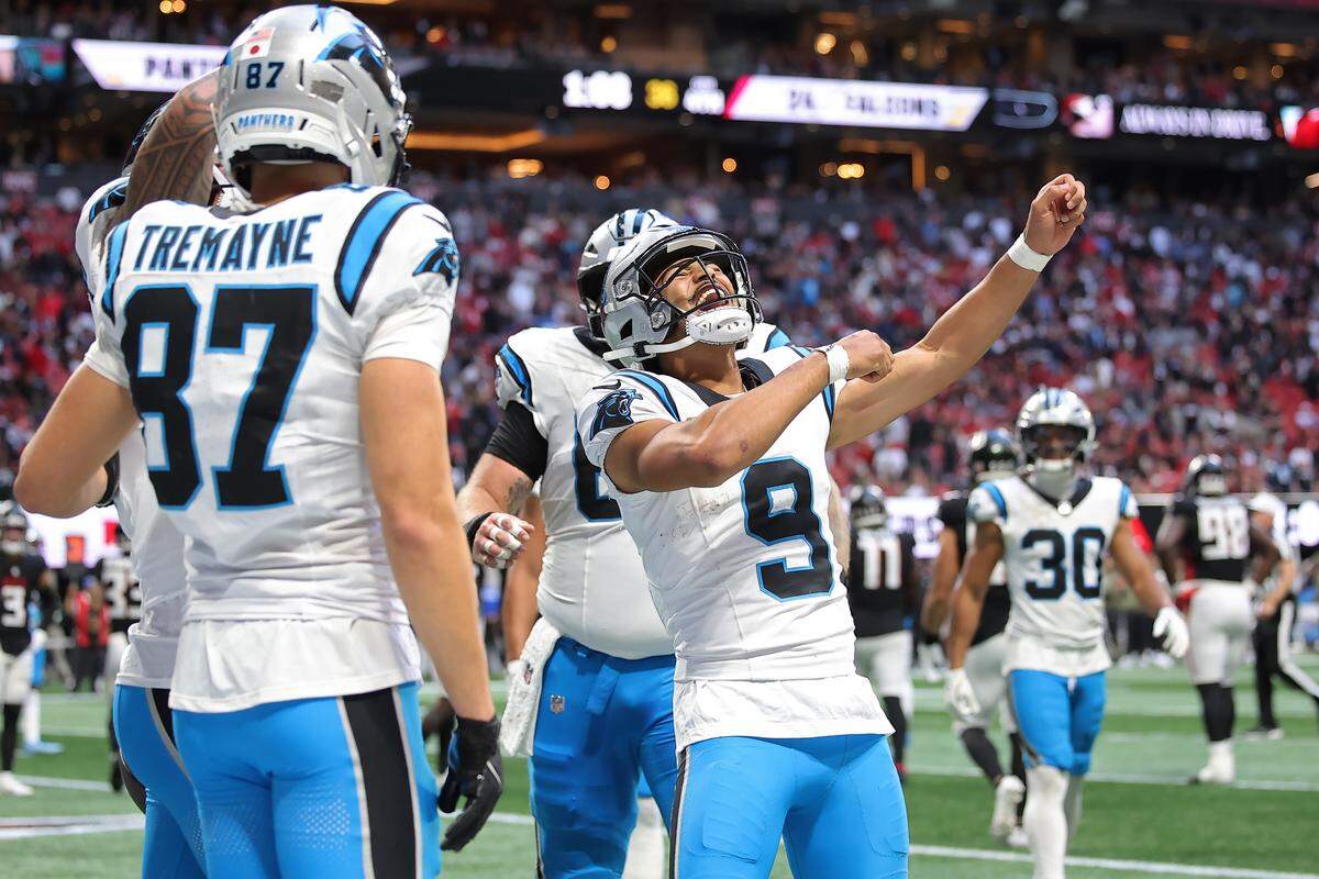 Carolina Panthers quarterback Bryce Young celebrates a touchdown during Sunday’s fourth quarter against the Atlanta Falcons at Mercedes-Benz Stadium in Atlanta.