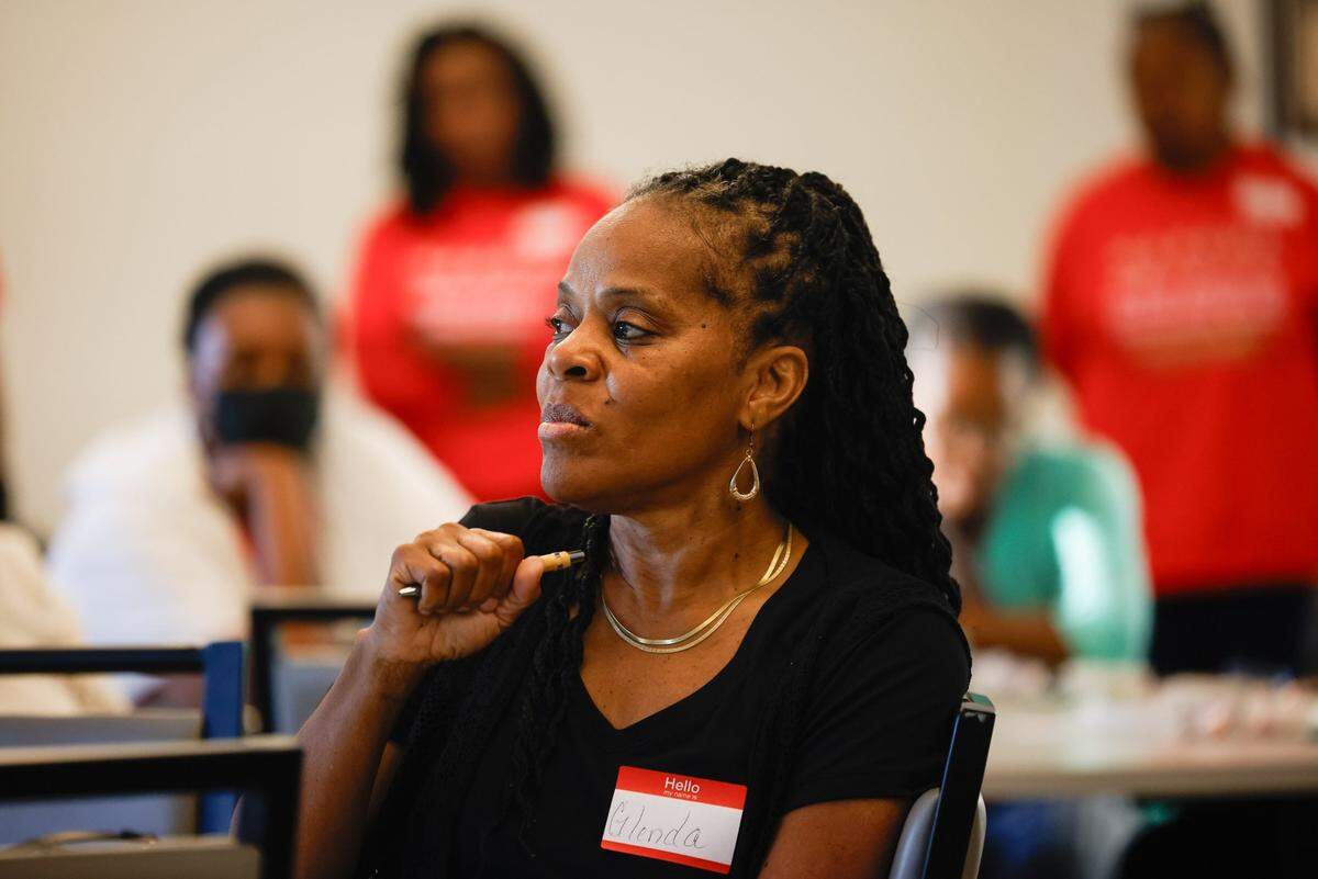 Glenda Bailey discusses how she copes with the loss of her son, Jaleel Nivens, during a gathering of Mothers Advocating for Real Change and Unwavering Support, a group for mothers who have lost a child to homicide, at Indian Trail Town Hall on May 15.