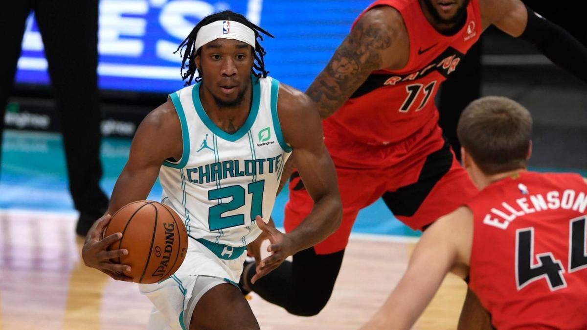 The Charlotte Hornets signed forward Xavier Sneed (21) to their roster Monday. He played for them in last year’s preseason.