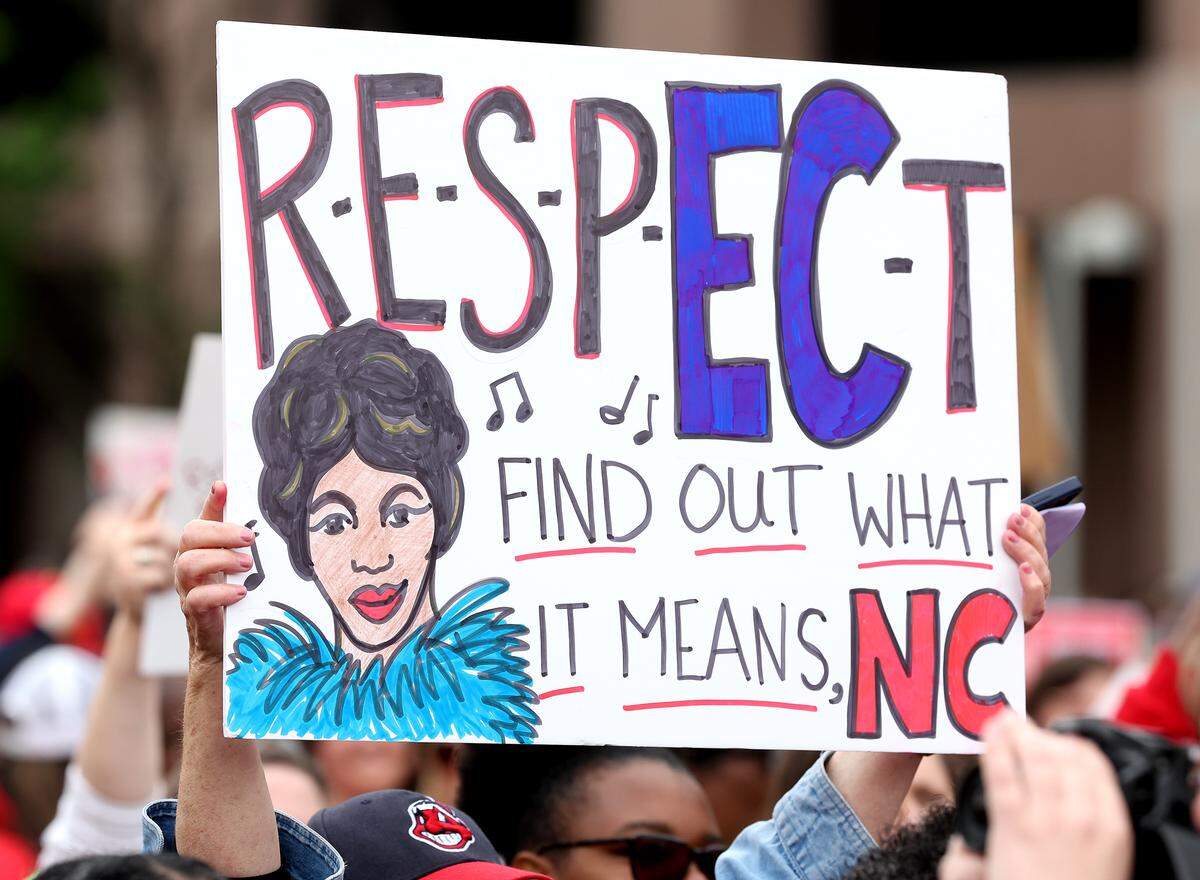 Signs, signs, signs were everywhere as teachers rallied at the Government Complex in Raleigh.