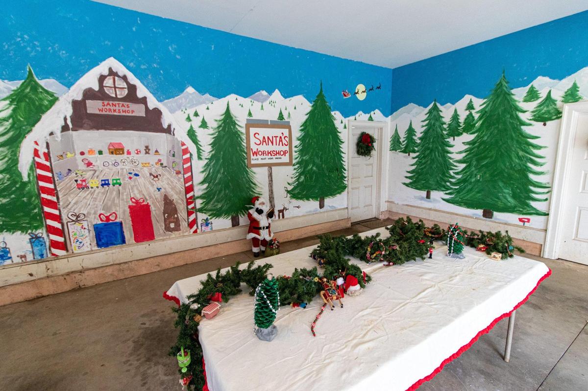 Dede Caughman painted a Santa’s Workshop mural inside of her mother’s garage in Charlotte.