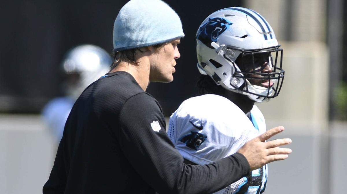 Carolina Panthers tight end Greg Olsen (88) returned to the practice fields on Wednesday, and he did more than just coach tight end Ian Thomas (80).