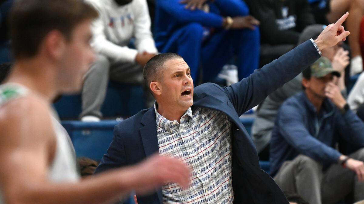 Weddington High head basketball coach Gary Ellington yells instructions to his team during fourth quarter action against Mooresville on Thursday, February 24, 2022. Weddington is top a top 25 nationally ranked team.