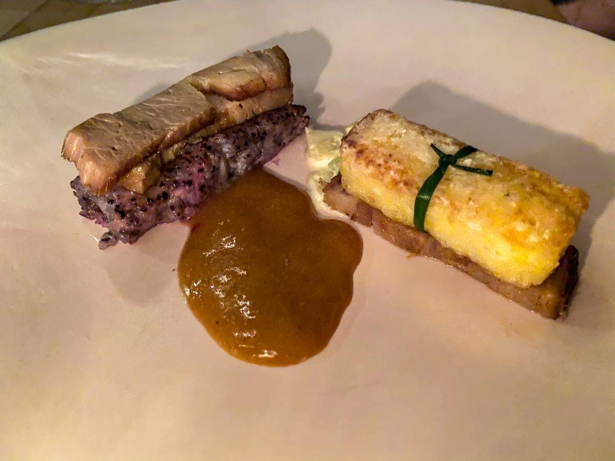 Eastern Carolina Barbecue Butt, Western Carolina Barbecue pudding, Purple Grits, Speckled Grits, Slaw at a recent Anomaly pop-up dinner.