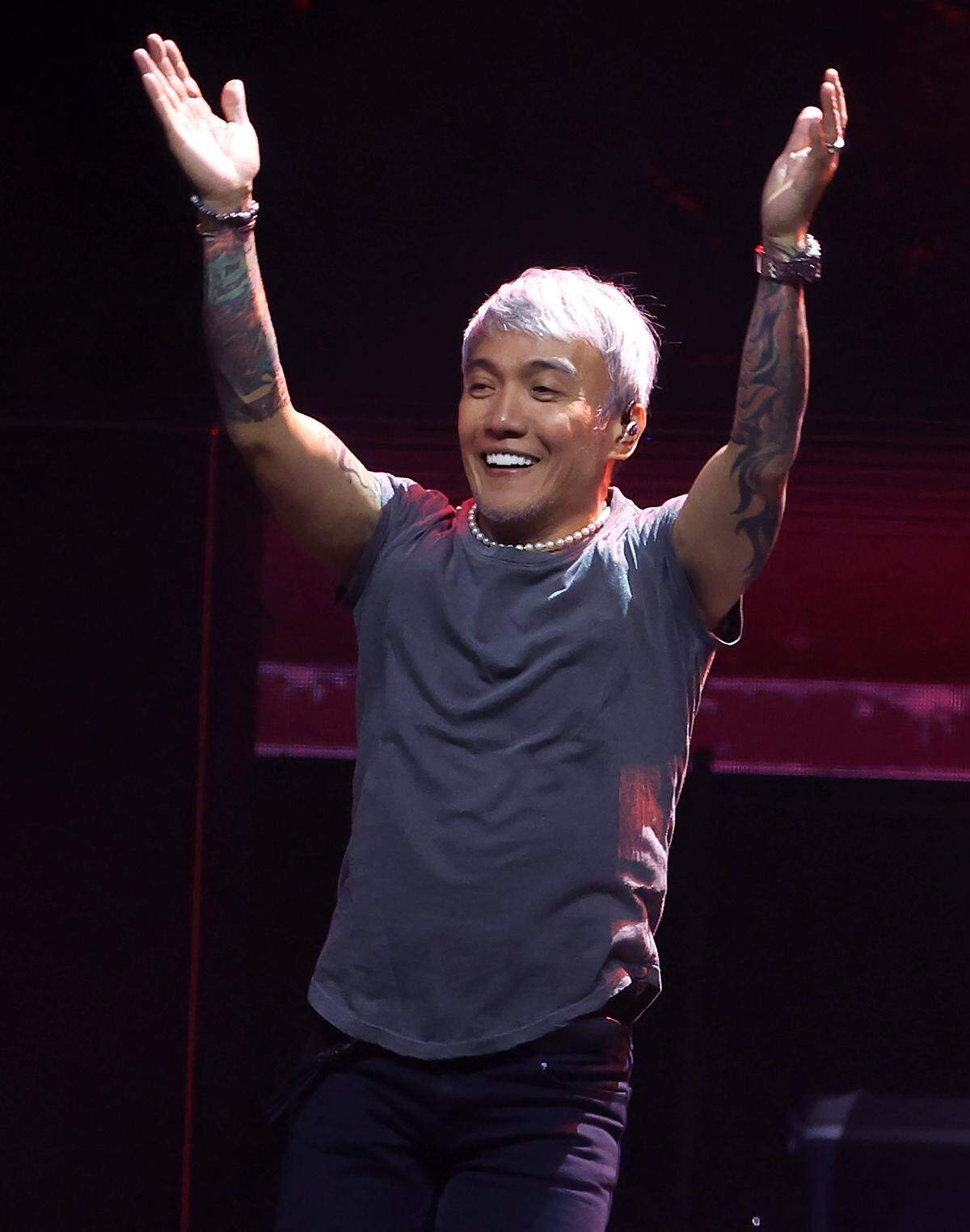Journey lead vocalist Arnel Pineda claps along with the audience during the bands Final Frontier Tour at Spectrum Center in Charlotte, NC on Wednesday, May 20, 2026