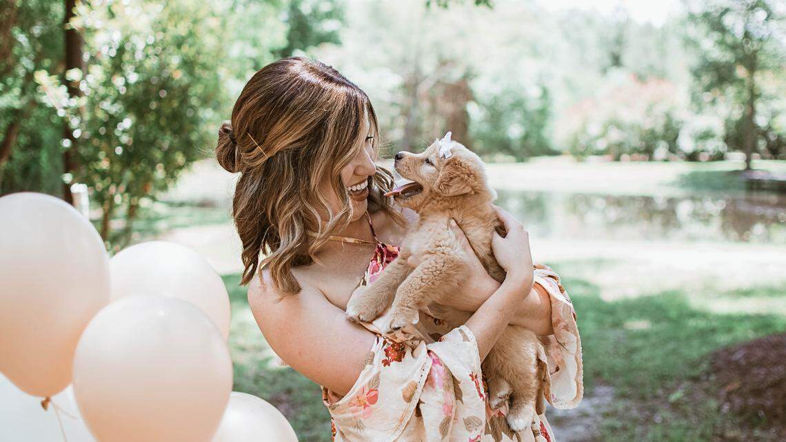 Joy Stone and her new puppy Rey, who was rescued after being found with four of her siblings beside a railroad track in Texas.