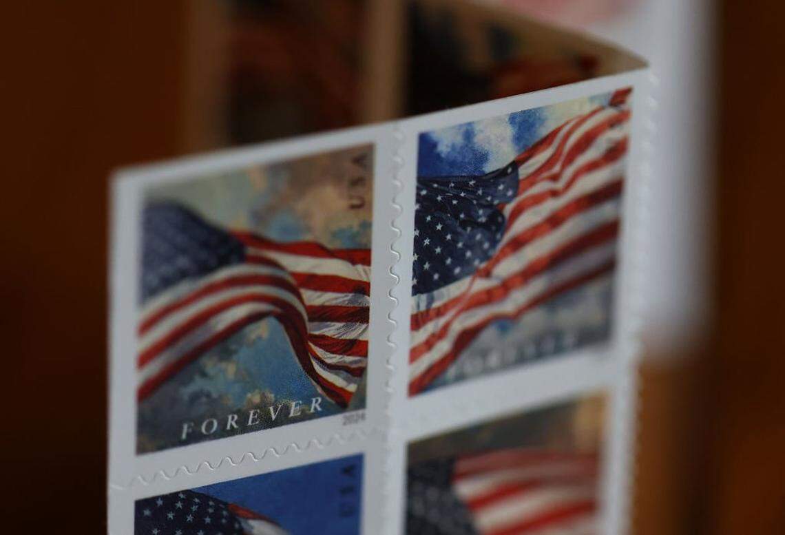 SAN ANSELMO, CALIFORNIA - JULY 12: In this photo illustration, U.S. Postal Service (USPS) forever stamps are displayed on July 12, 2024 in San Anselmo, California. The USPS is raising the price of a first-class stamp from 63 cents to 73 cents, up 78 percent from when the forever stamp was first introduced in 2007 for 41 cents. (Photo by Justin Sullivan/Getty Images)