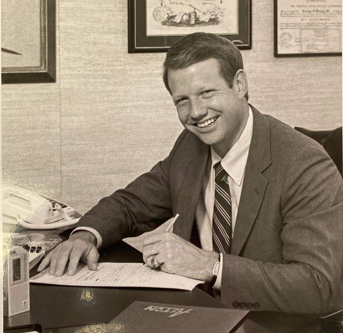 In this undated photo, developer George “Steele” Dewey III is shown at his desk at the former location of his Aston Properities company on Morrison Boulevard in South Park.