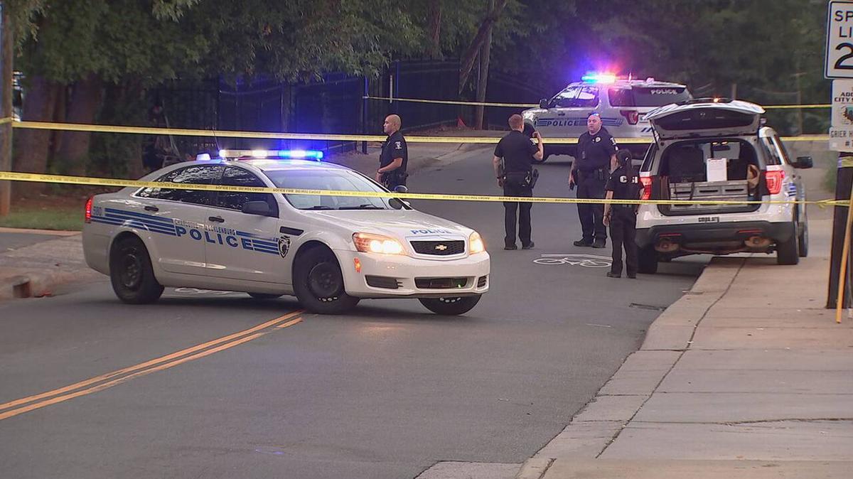 In this image from Observer news partner WSOC, yellow tape closes off a part of Marvin Road in southeast Charlotte as police officers investigate a homicide on Monday, Aug. 22, 2022.