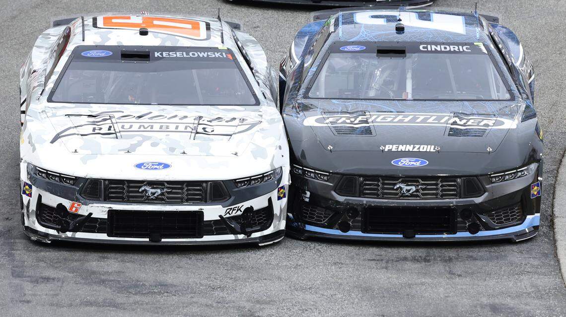 NASCAR Cup Series drivers Brad Keselowski, left and Austin Cindric, right, battle for the final position in the Last Chance Qualifier race for the Cookout Clash on Wednesday, February 4, 2026 at Bowman Gray Stadium in Winston-Salem, NC. Cindric was able to hold off Keselowski.