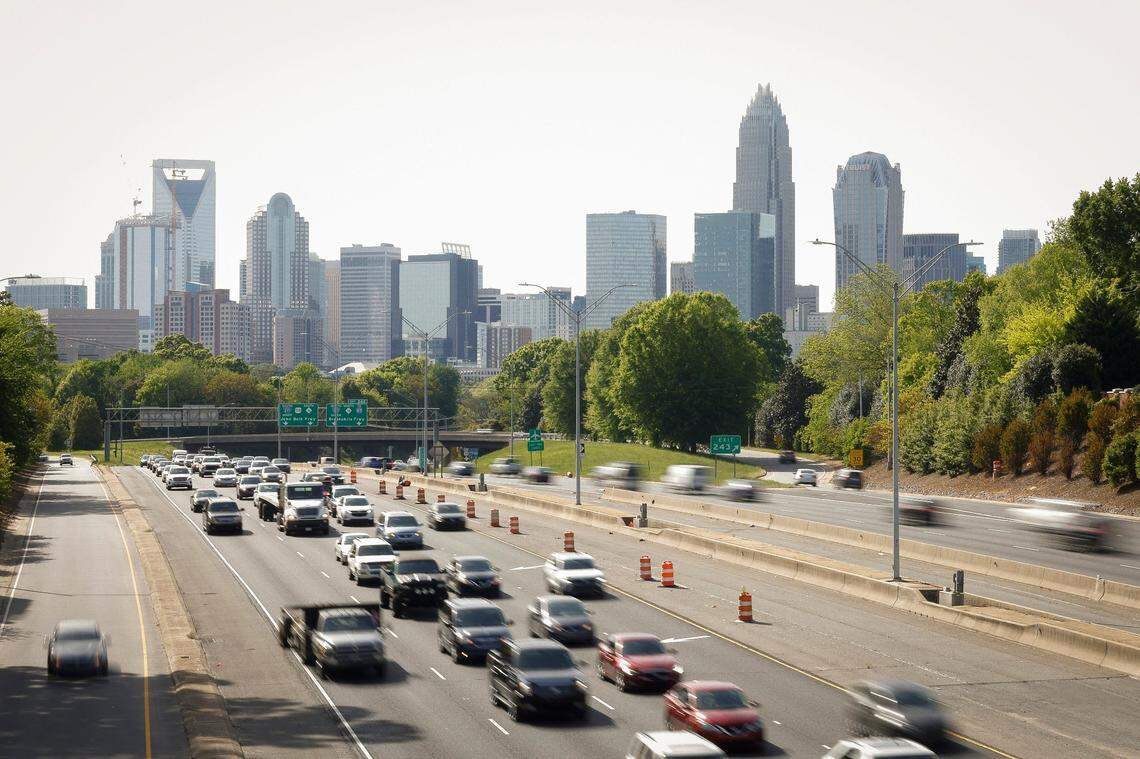 Motorists travel along the East Independence Expressway near uptown Charlotte, N.C., Wednesday, April 20, 2022.