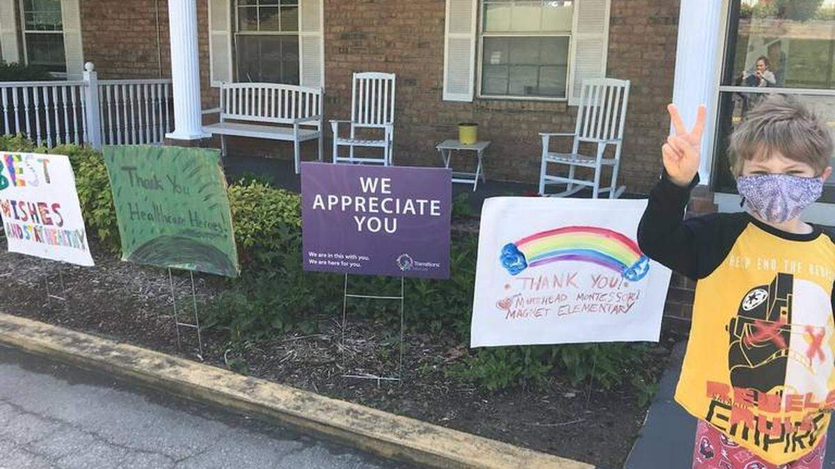 Children posted messages of love outside this Durham nursing home. Strict limits on in-person visits are taking a toll on nursing home residents.