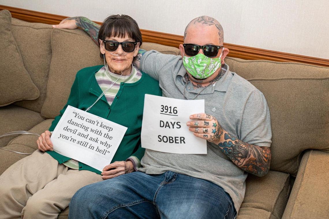Betty Simmons and her grandson, Donnie Simmons, spend a moment together at home.