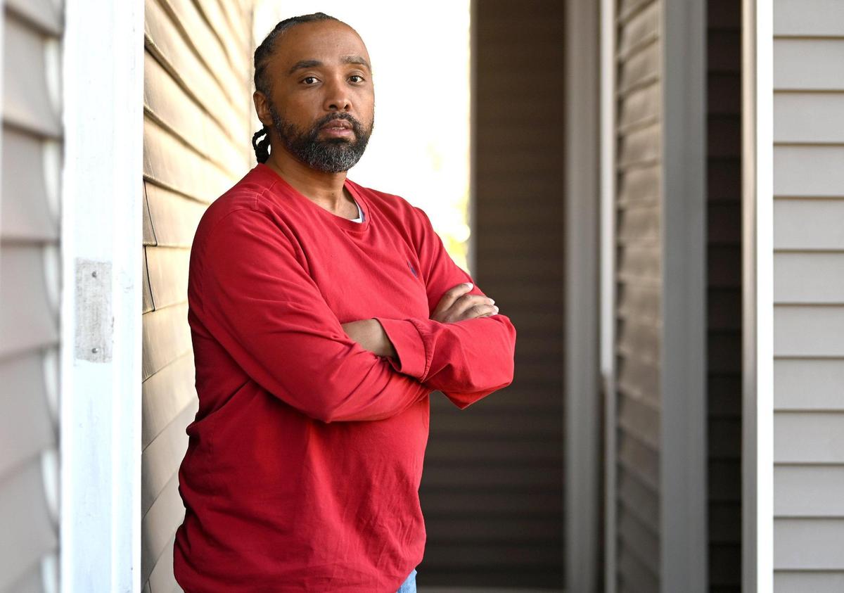 Conrad Burke and his lawyer say that he spent extra time in the Mecklenburg County jail because of eCourts.
