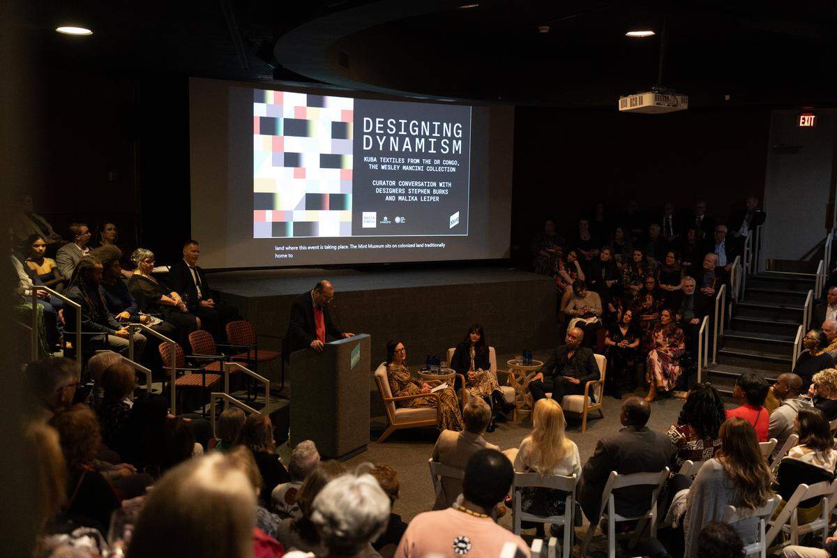 Designers Stephen Burks and Malika Leiper, speak during a curator talk "Designing Dynamism: Kuba Textiles from the DR Congo, The Wesley Mancini Collection," at the Mint Museum Randolph in Charlotte, N.C., on Thursday, February 19, 2026.