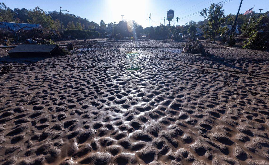 Inches of mud cover Biltmore Village in Asheville on Wednesday October 2, 2204. The area received extensive damage from flooding of the Swannanoa River after the remnants of Hurricane Helene caused torrential rainfall in western North Carolina.