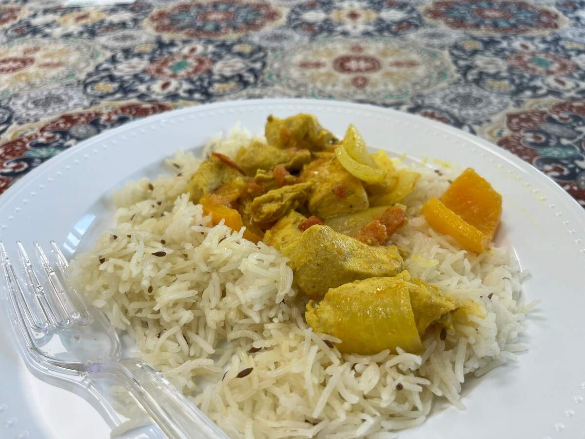 After a Santhoshi’s Kitchen’s cooking class, the guests will sit down to eat their creation. Here, the dish is chicken tikka masala and jeera rice.