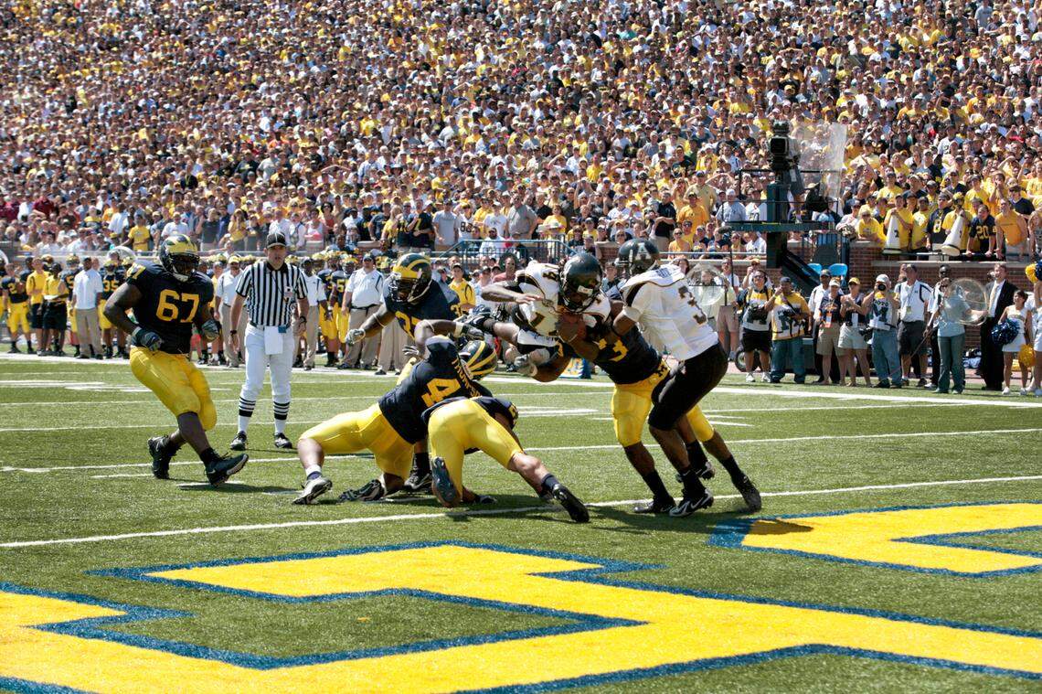 In 2007, Armanti Edwards leaps into the end zone for a touchdown during Appalachian State’s 34-32 upset win over then-No. 5 Michigan in Ann Arbor, Mich. Edwards accounted for four touchdowns in the game -- three passing, one rushing. App State would go on to win its third consecutive FCS national championship later that year.
