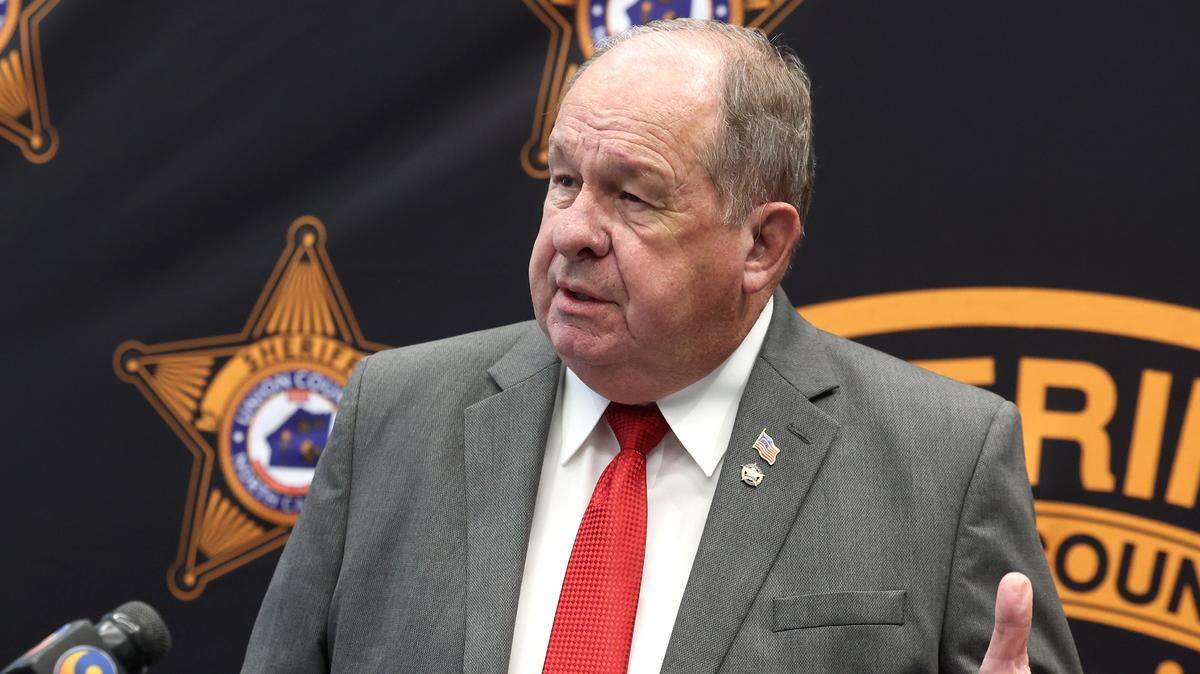 Union County Sheriff Eddie Cathey speaks to the media about the investigation into the shooting and arrest of a suspect in the Taco Bell restaurant in Indian Trail  on Oct. 15. 