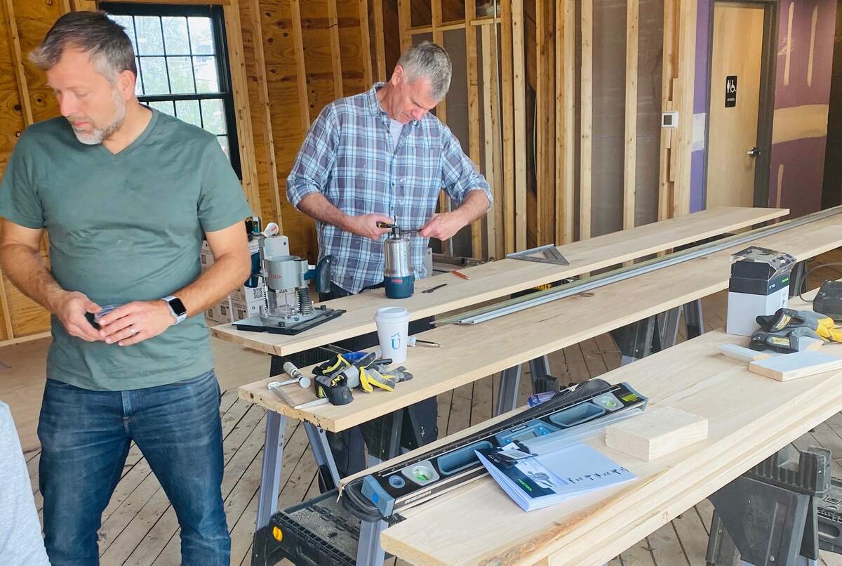 Jeff Tonidandel works in the makeshift woodshop in the cocktail bar at Supperland, which is under construction.