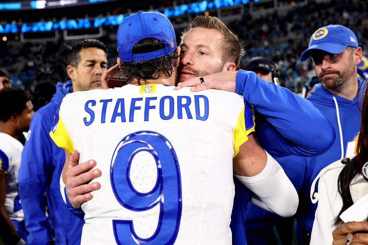 CHARLOTTE, NORTH CAROLINA - JAN. 10: Matthew Stafford #9 of the Los Angeles Rams celebrates with Head coach Sean McVay after defeating the Carolina Panthers with a score of 34 to 31 in the NFC Wild Card Playoff game at Bank of America Stadium on Jan. 10, 2026 in Charlotte, North Carolina. (Photo by Jared C. Tilton/Getty Images)