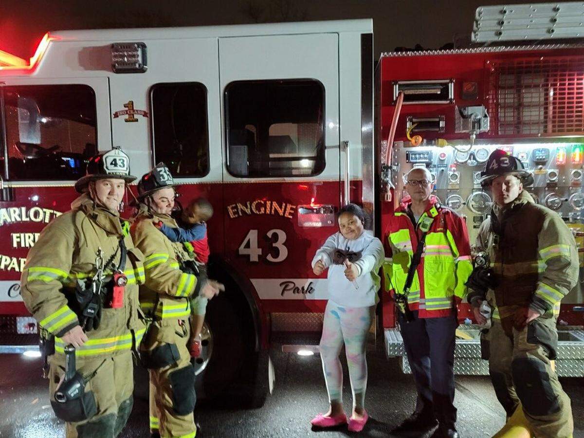 Charlotte Fire dispatcher John Schuler and Tyshala Wilson, 11, were featured on an episode of A&E’s “Panic 911” on July 30. Tyshala and her 6-year-old brother, Hampton, were surrounded by flames during a kitchen fire in their apartment on March 16, 2021.
