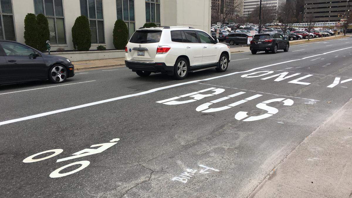 A shared bus/bike-only lane that opened last month along East Fourth Street in uptown Charlotte will encourage public use of transit and help identify other places to put similar lanes elsewhere in Charlotte, the Charlotte Area Transit System said.