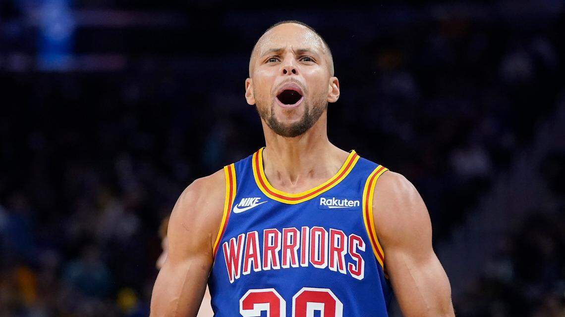 Golden State Warriors guard Stephen Curry (30) reacts toward fans against the Atlanta Hawks during an NBA basketball game in San Francisco, Monday, Nov. 8, 2021. (AP Photo/Jeff Chiu)