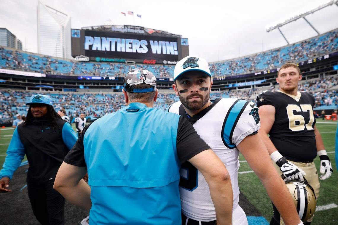 Carolina Panthers head coach Matt Rhule shakes hands with Carolina Panthers quarterback Baker Mayfield (6) after the Panthers defeated the New Orleans Saints 22-14 during a game at Bank of America Stadium in Charlotte, N.C., Sunday, Sept. 25, 2022. It was the only win the two had together with the Panthers.