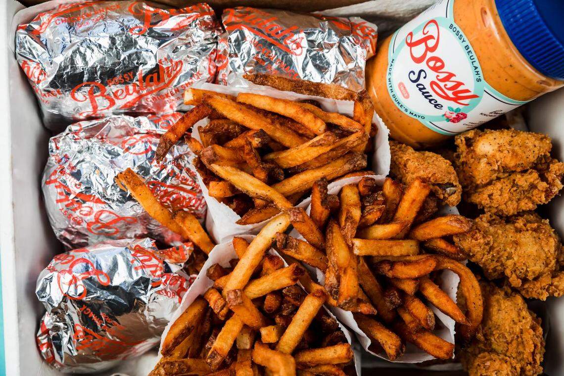 Enjoy a box of four Beauts (Joyce Farms fried chicken breast, pickles, Duke’s mayo, Copain bun) with wings and fries from Bossy Beulah’s.
