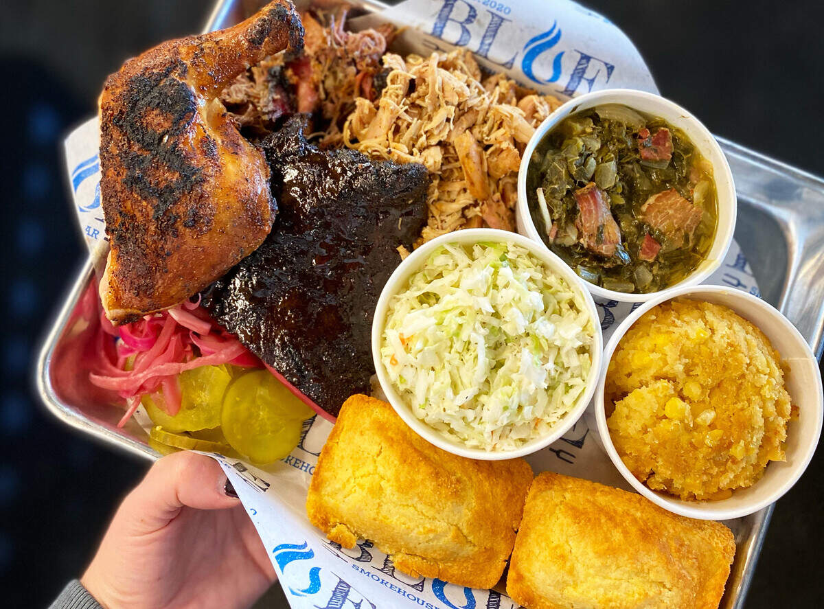 Blue Smokehouse’s Pick 4 Combo with pulled pork, pulled chicken, a chicken leg and thigh, and 1/4 slab of ribs.