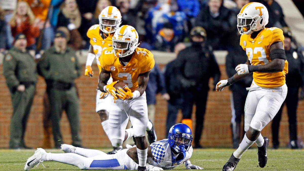 Tennessee defensive back Marquill Osborne (3) intercepts a pass intended for Kentucky wide receiver Tavin Richardson (11) in the second half of an NCAA college football game Saturday, Nov. 10, 2018, in Knoxville, Tenn. Tennessee won 24-7. (AP Photo/Wade Payne)