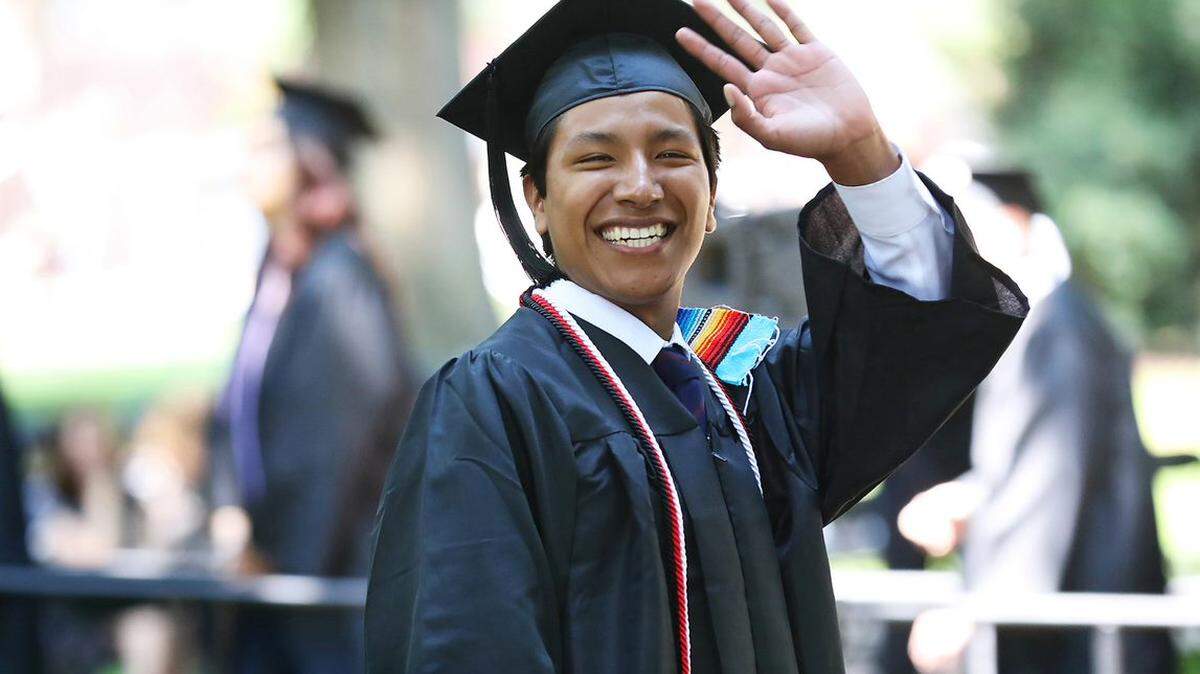 Tony Solis celebrates his 2019 graduation from Davidson College. He is a first generation college graduate and one of the more than  800,000 U.S. residents who have benefited from DACA status. Solis, who has lived in the U.S. since age 6, is now a graduate student at Princeton. 