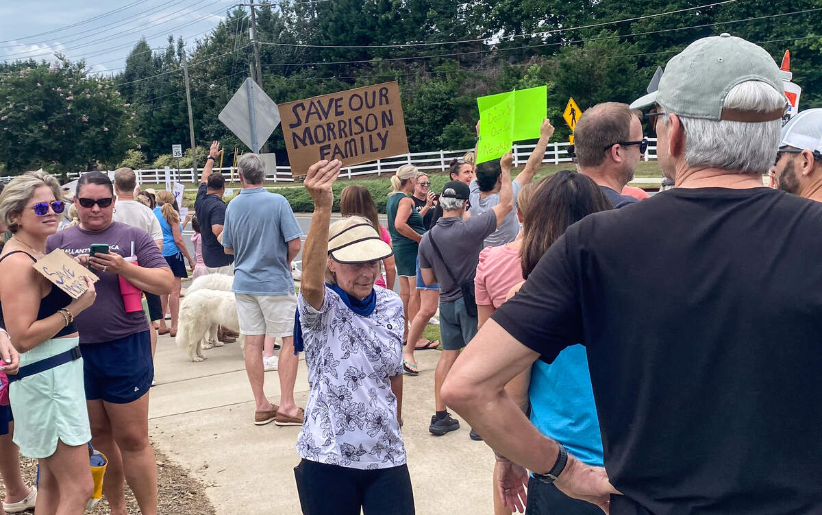 Marchers protest the sale of the Morrison YMCA Sunday to a local church.