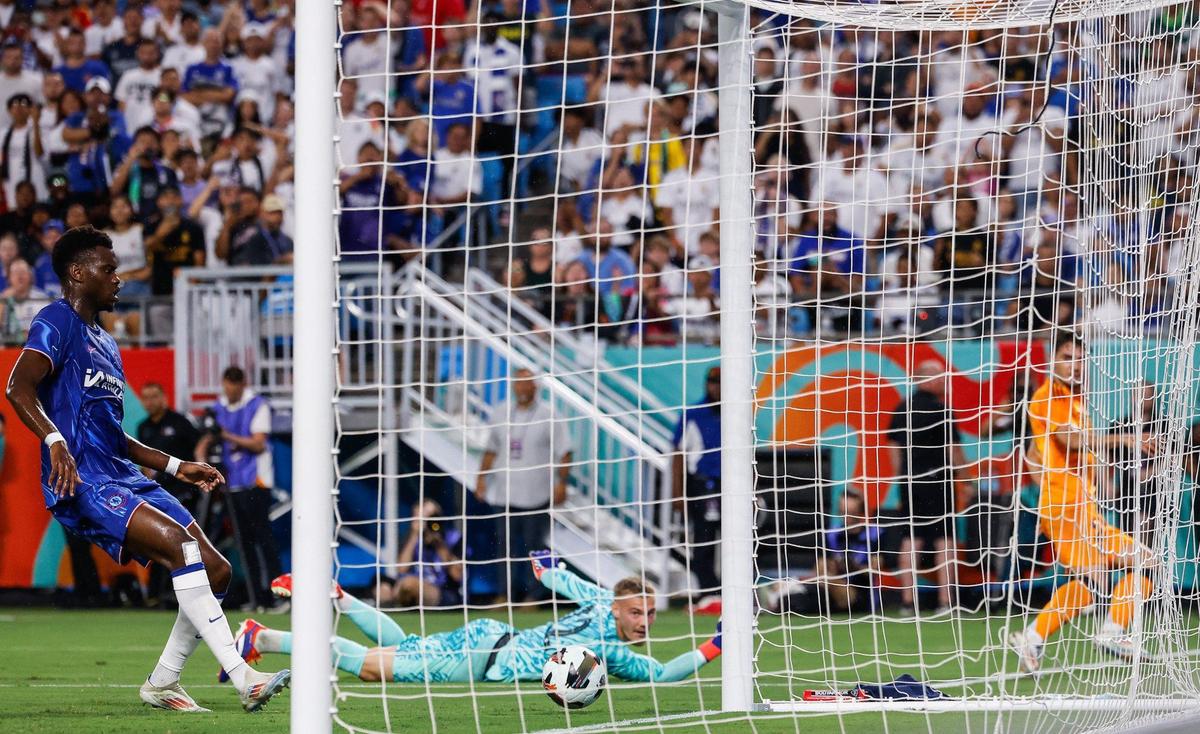 Chelsea’s goalie Filip Jorgensen, center, watches as the ball enters the net as Real Madrid’s Brahim Diaz scores during the match at Bank of America Stadium in Charlotte, NC on Tuesday, August 6, 2024. Real Madrid won, 2-1.