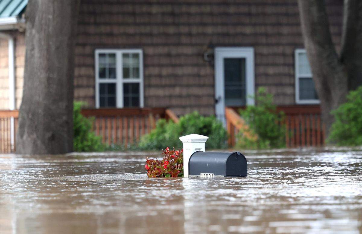 A mailbox is submerged in flood water near the intersection of Hart Rd. and Riverhaven Drive on Saturday, September 28, 2024.