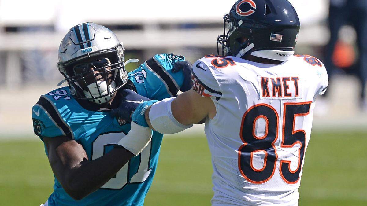 Former Carolina Panthers defensive end Stephen Weatherly, left, got complacent in Charlotte, he said Monday.