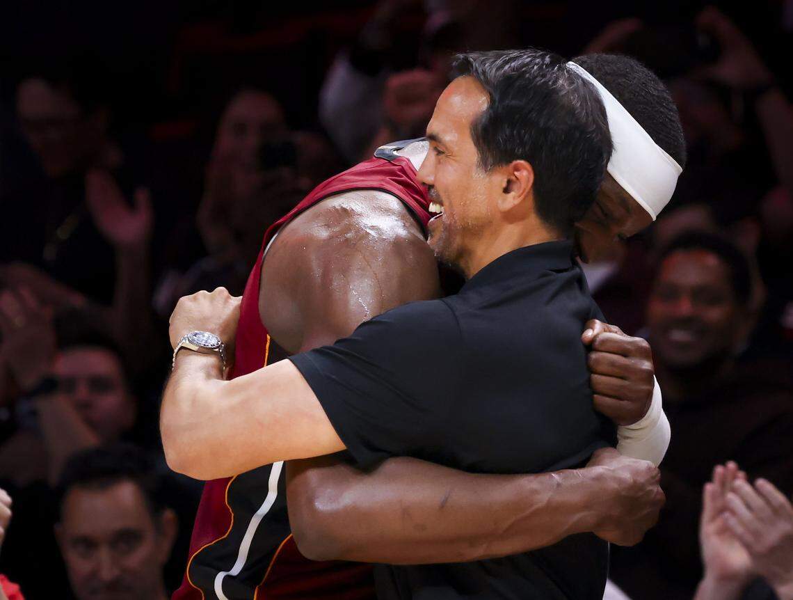 Miami Heat center Bam Adebayo hugs head coach Erik Spoelstra after he scored 83 points against the Washington Wizards, marking the second-highest single-game point total in NBA history, on March 10 at Kaseya Center in downtown Miami. The Miami Heat won 150-129.