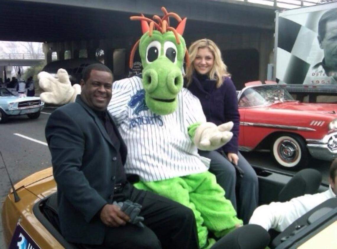 Danielle Trotta with former WBTV sports director Delano Little and Charlotte Knights mascot Homer at Charlotte’s Thanksgiving Day parade in 2008.