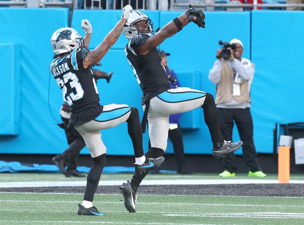 Carolina Panthers cornerback Mike Jackson, right, and teammate/cornerback Dane Jackson, left, celebrate Mike Jackson’s stopping New Orleans Saints wide receiver Cedrick Wilson Jr., from making a pass reception during late fourth quarter action at Bank of America Stadium in Charlotte, NC on Sunday, November 3, 2024. The Panthers defeated the Saints 23-22.