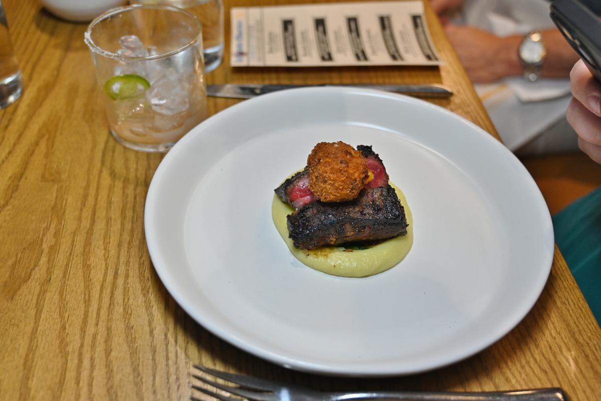 Grilled Wagyu beef, topped with a pimento cheese croquette, at Restaurant Constance.