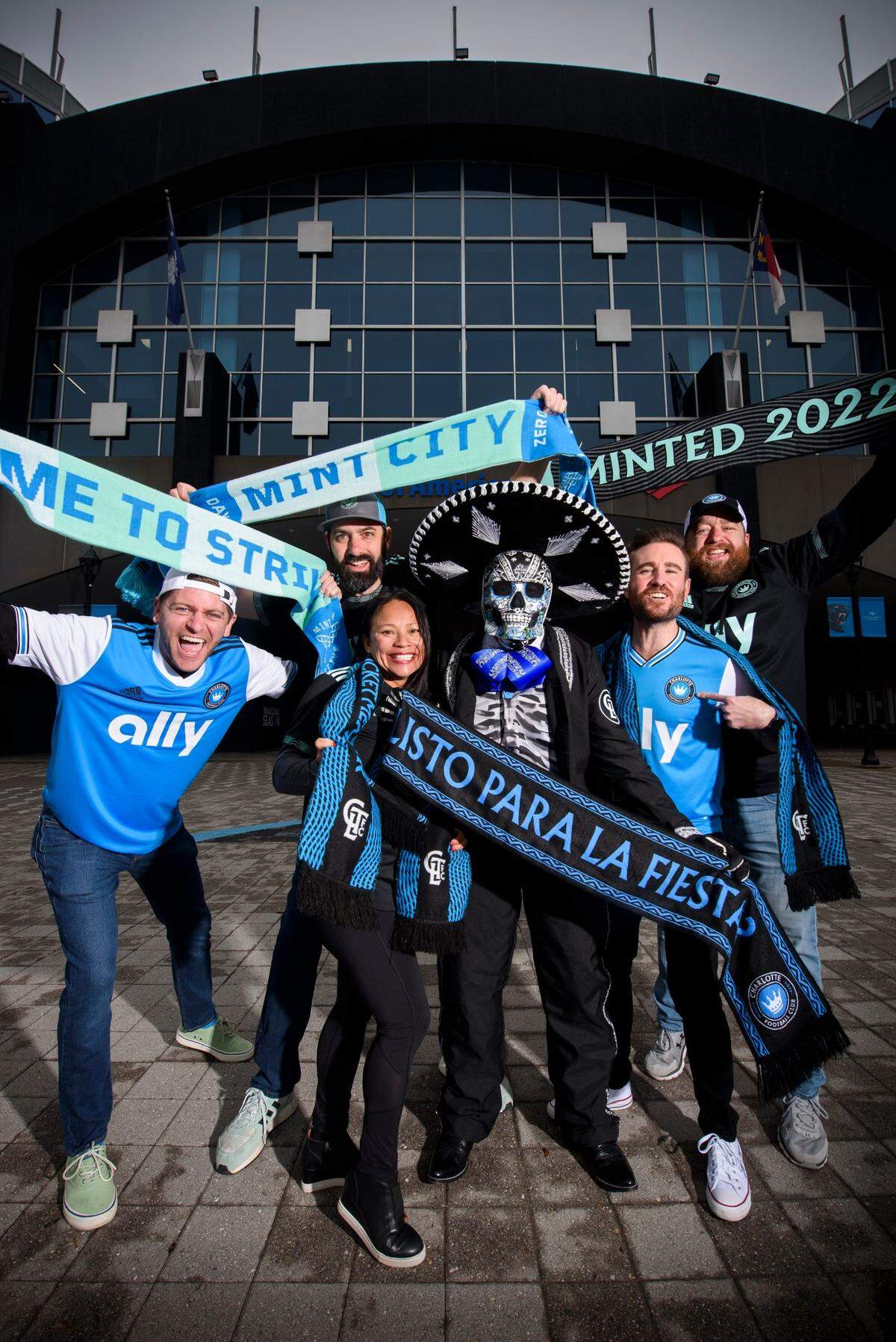 Charlotte FC super fans Terry Hines, of Charlotte, N.C., from left, Jake Carpenter, of Harrisburg, N.C., Van ONeill, of Matthews, N.C., Chico Sanchez, of Salisbury, N.C., Tyler Benson, of Charlotte, and Matt Barbee, of Greensboro, N.C., appear at Bank of America Stadium in Charlotte, Thursday, Feb. 24, 2022. Charlotte FC opens at home on Saturday, March 5, 2022, against the LA Galaxy.